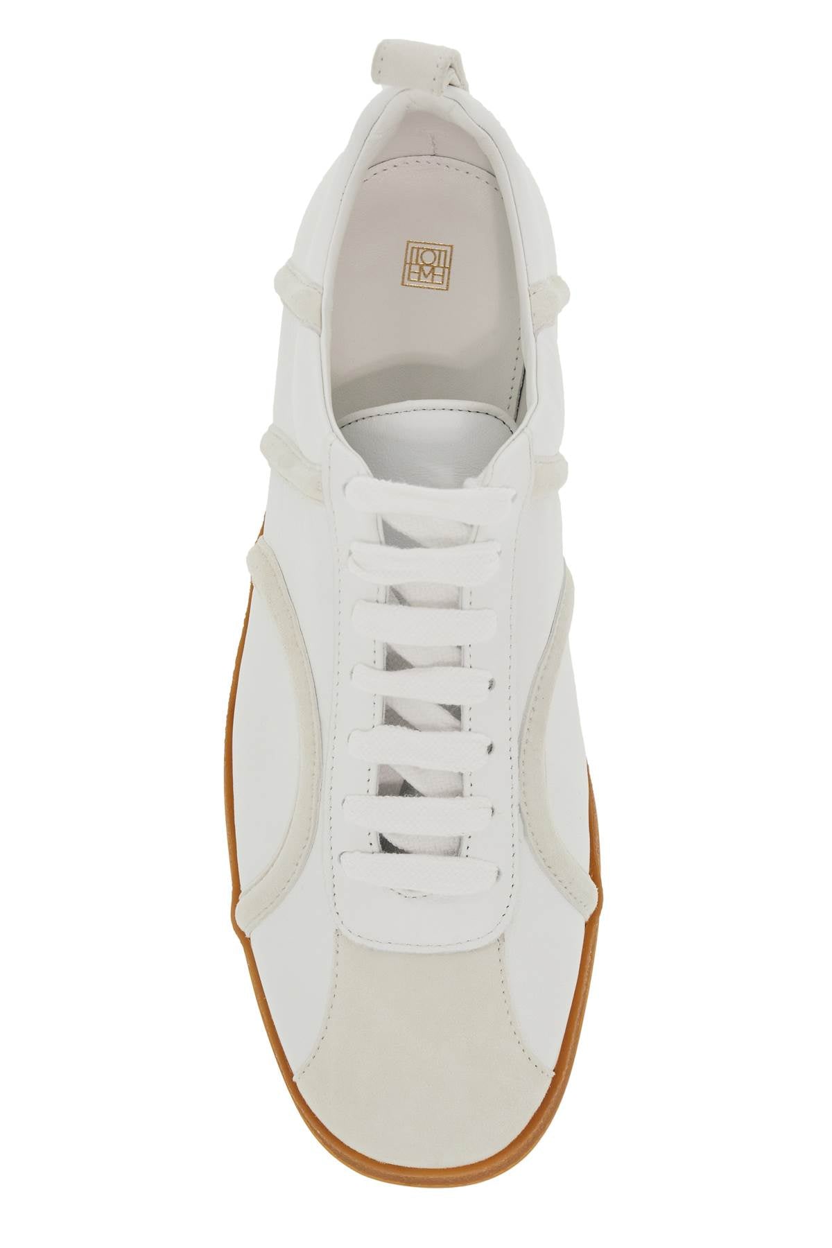 Toteme leather sneakers with suede monogram