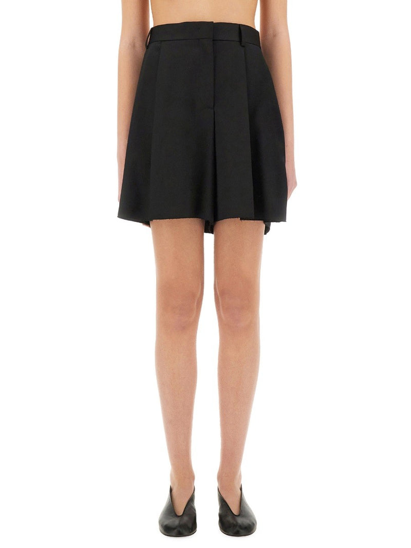 ASYMMETRICAL WOOL SHORTS