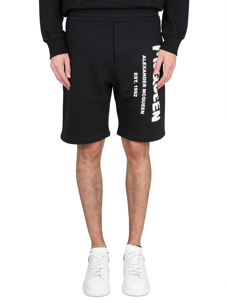 BERMUDA SHORTS WITH GRAFFITI LOGO PRINT