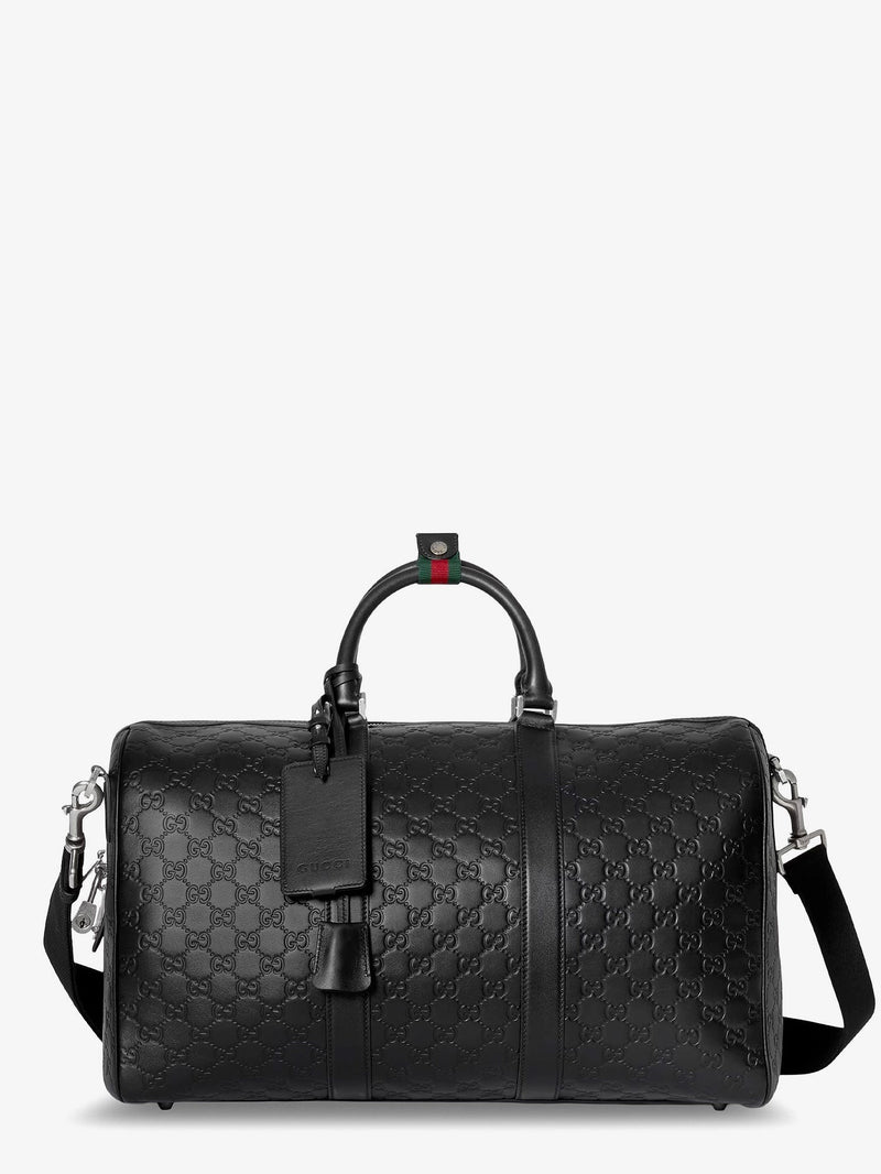 Coated canvas GG Emblem travel bag with GG motif