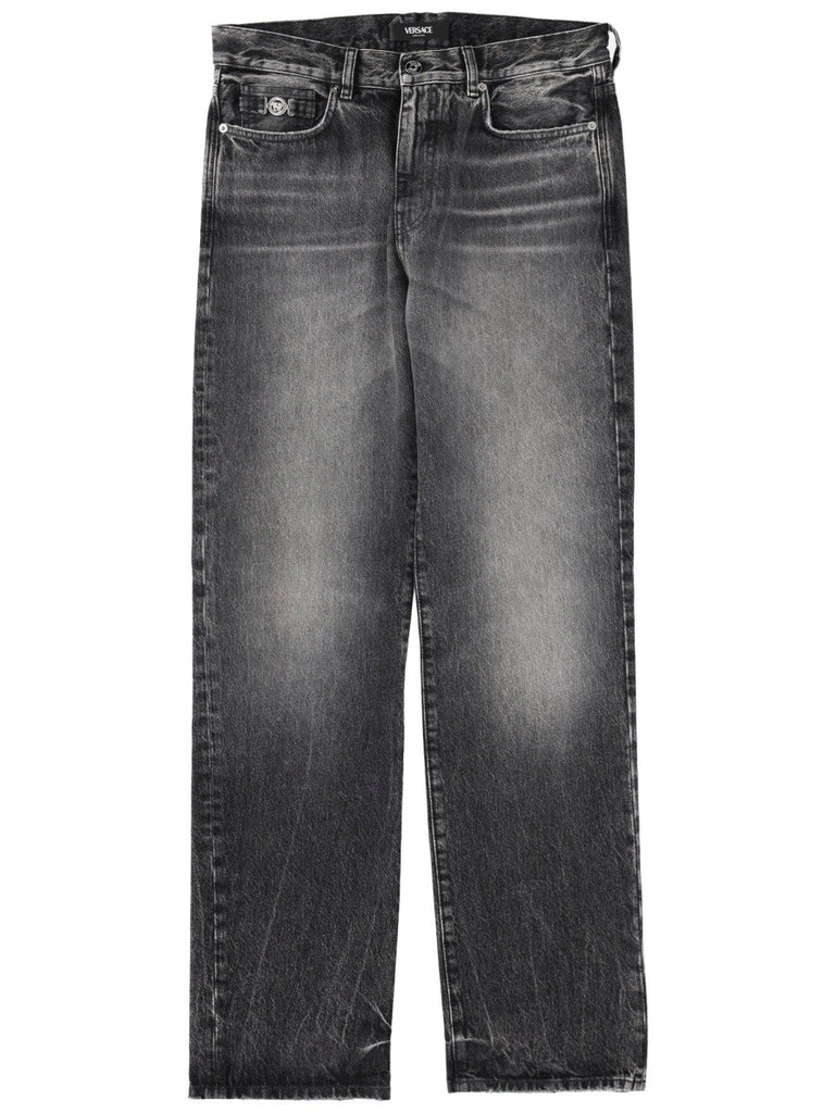 JEANS WITH "MEDUSA" DETAIL