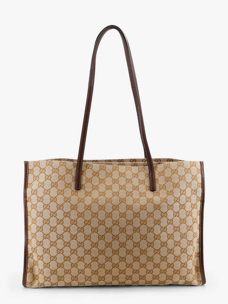 Le Loft De Paris Gucci monogram canvas tote bag in beige and brown with leather trim and slim shoulder straps.