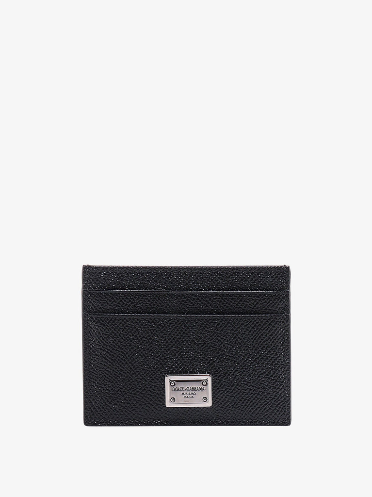 Leather card holder with metal logo tag