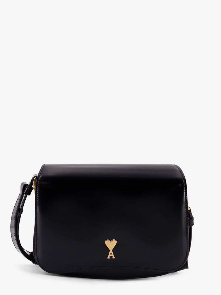 Leather shoulder bag with metal logo on the front