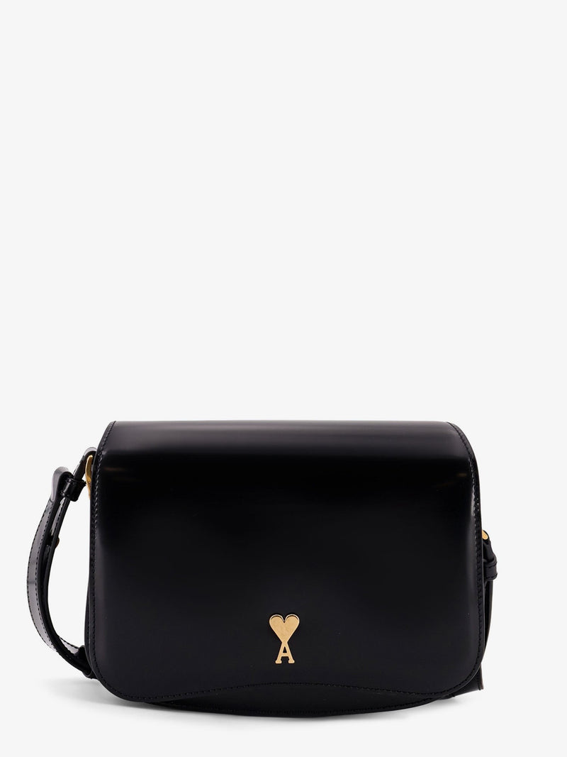 Leather shoulder bag with metal logo on the front