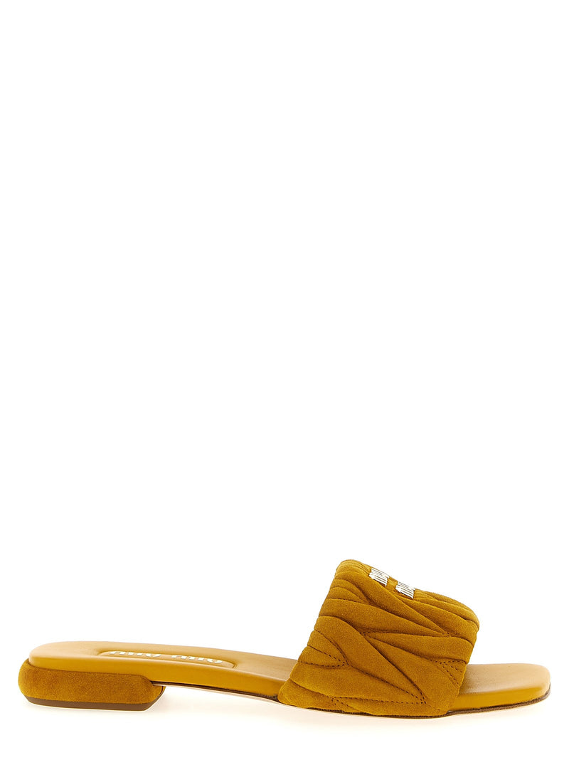 Matelassé suede slides