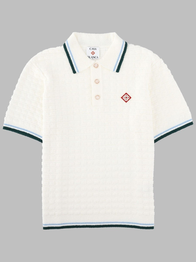 POLO BOUCLÉ CON LOGO