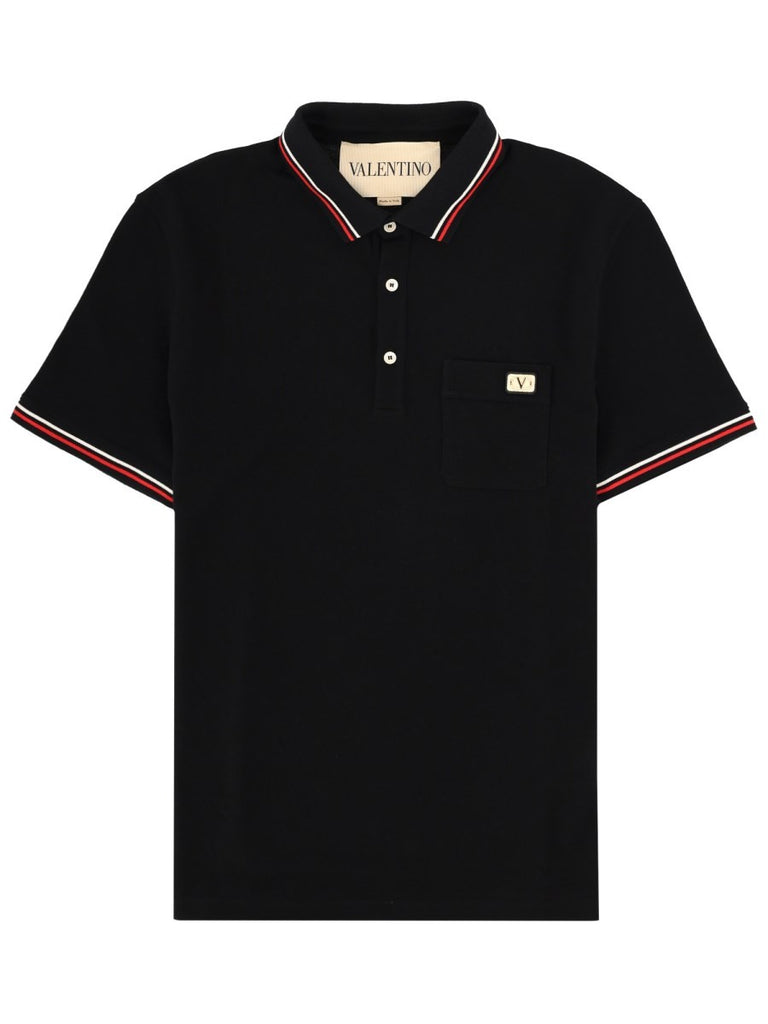 POLO CON PATCH LOGO
