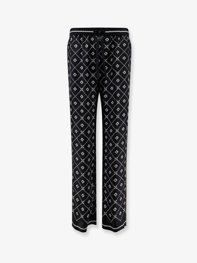 Silk trousers with all-over logo print