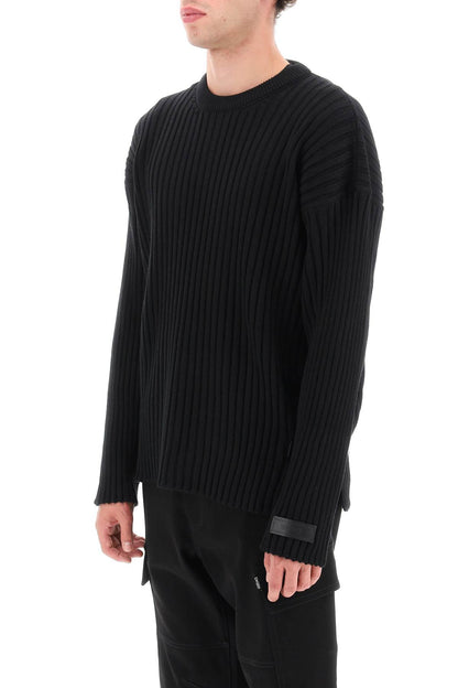 Versace Versace ribbed-knit sweater with leather straps